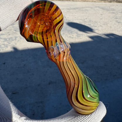 Fume Linework over Amber Spoon